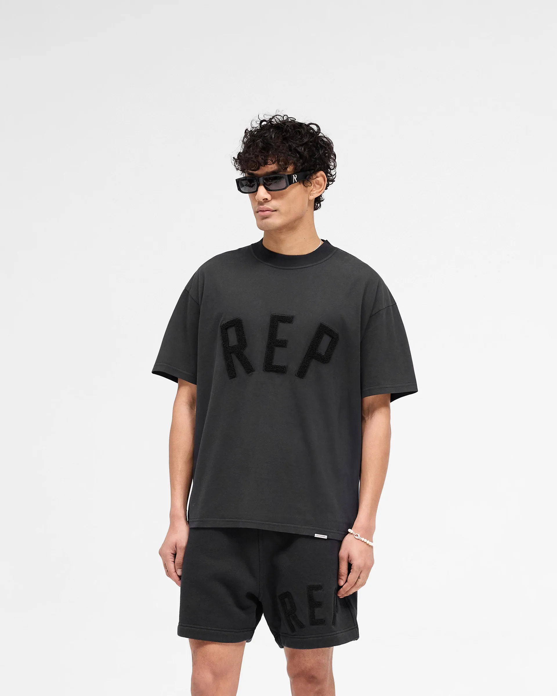 Casual Elegance Rep Applique T-Shirt - Off Black