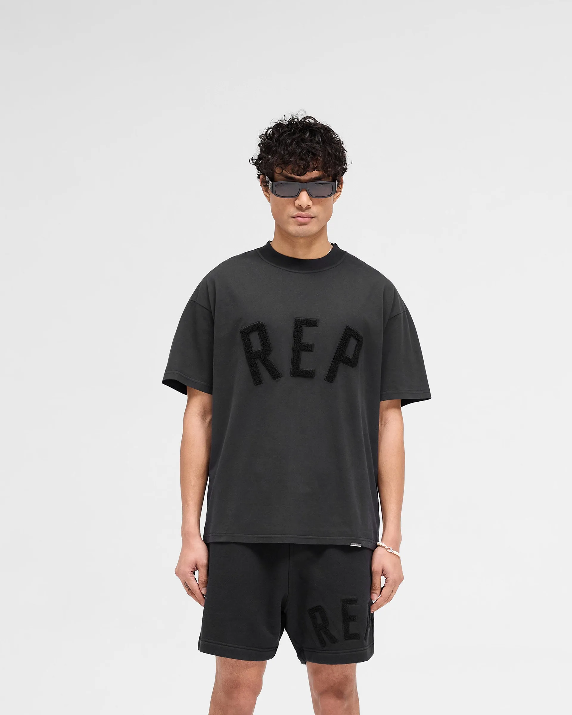 Cozy Design Rep Applique T-Shirt - Off Black