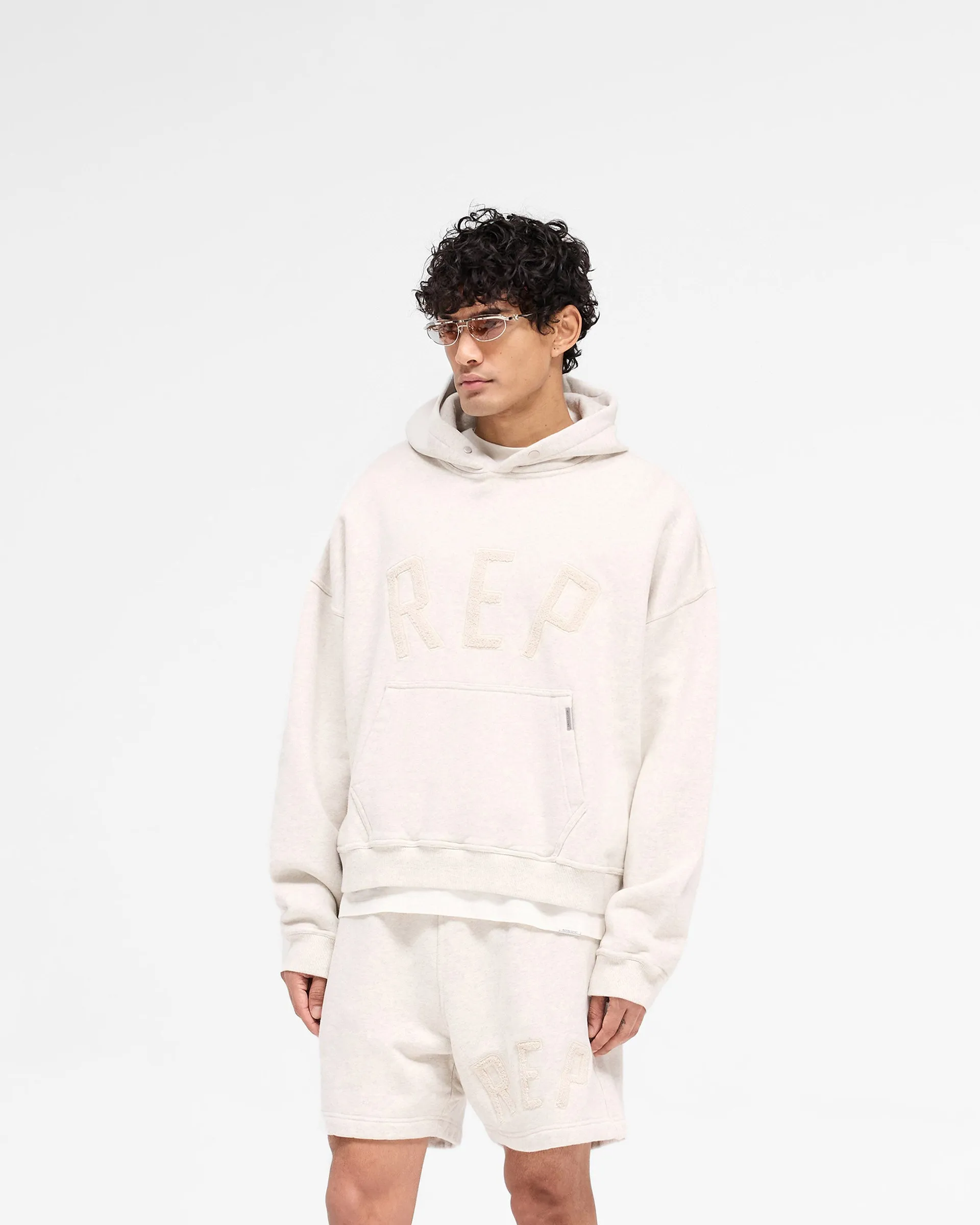 Rep Applique Hoodie - Cream Marl earthy colors