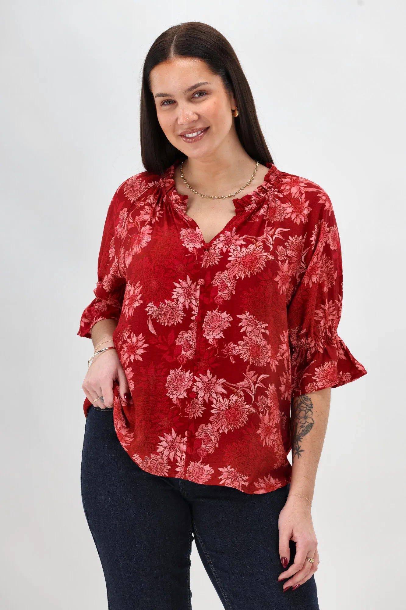 Gloss The Label Sophia Ruffle Neck Blouse Rust Floral TexturedSurface